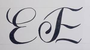 e in cursive​